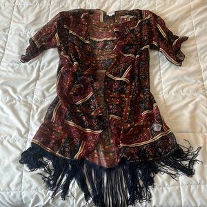 Brand new Lularoe small sheer cover-up, never worn no tears flaws